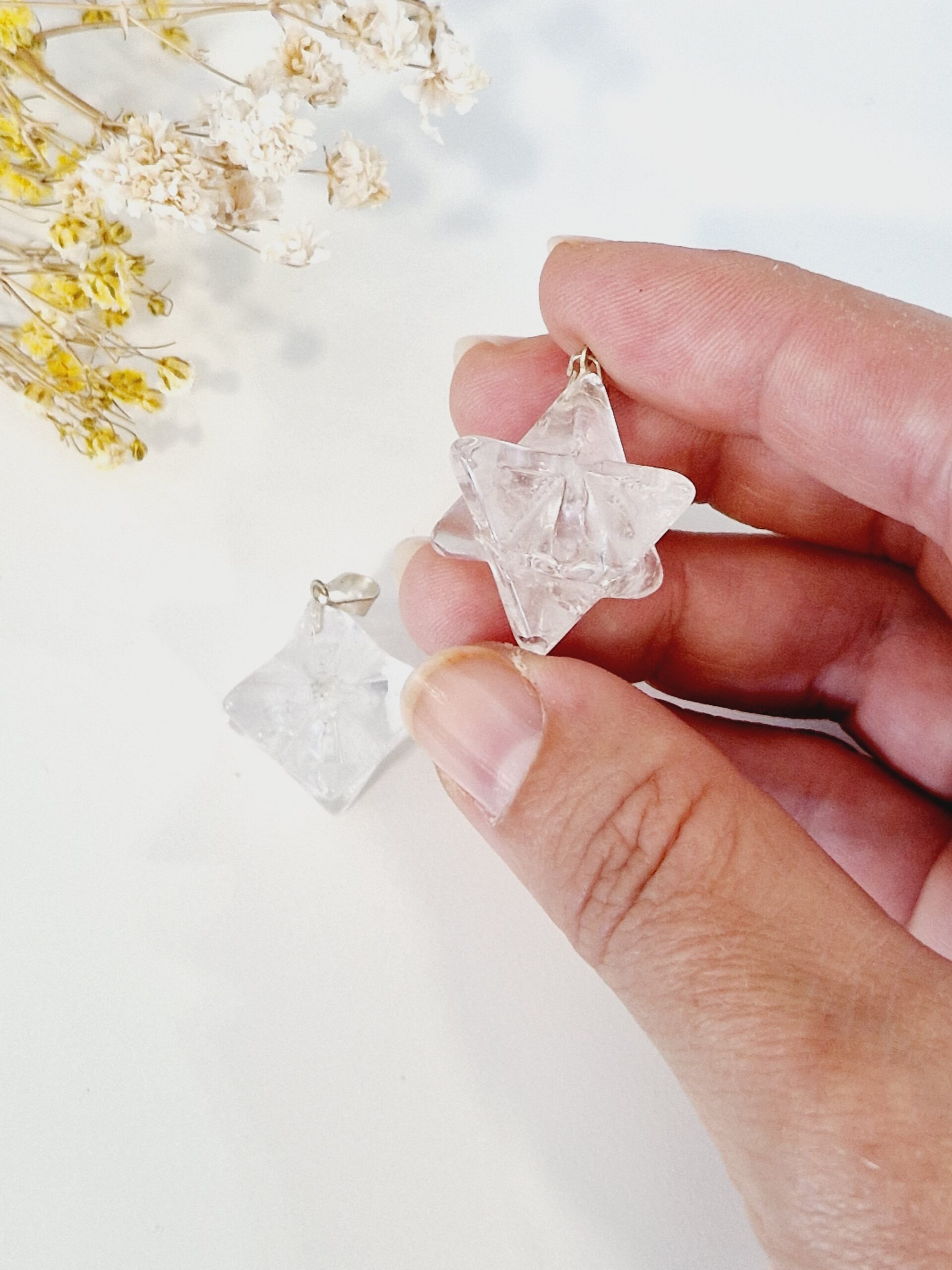 Colgante merkaba de cuarzo